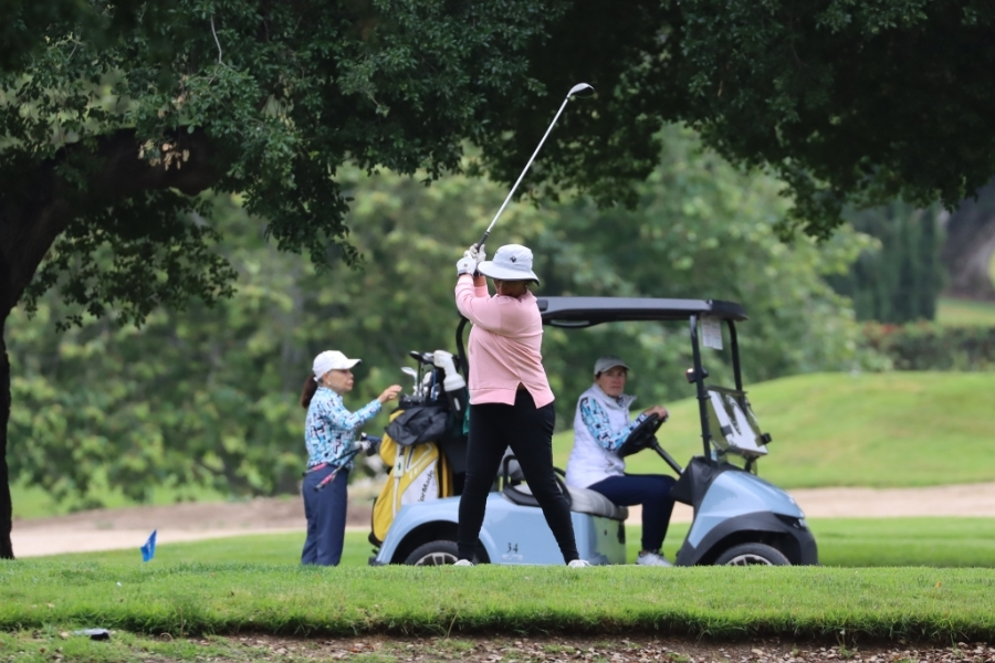 Women golfers celebrating