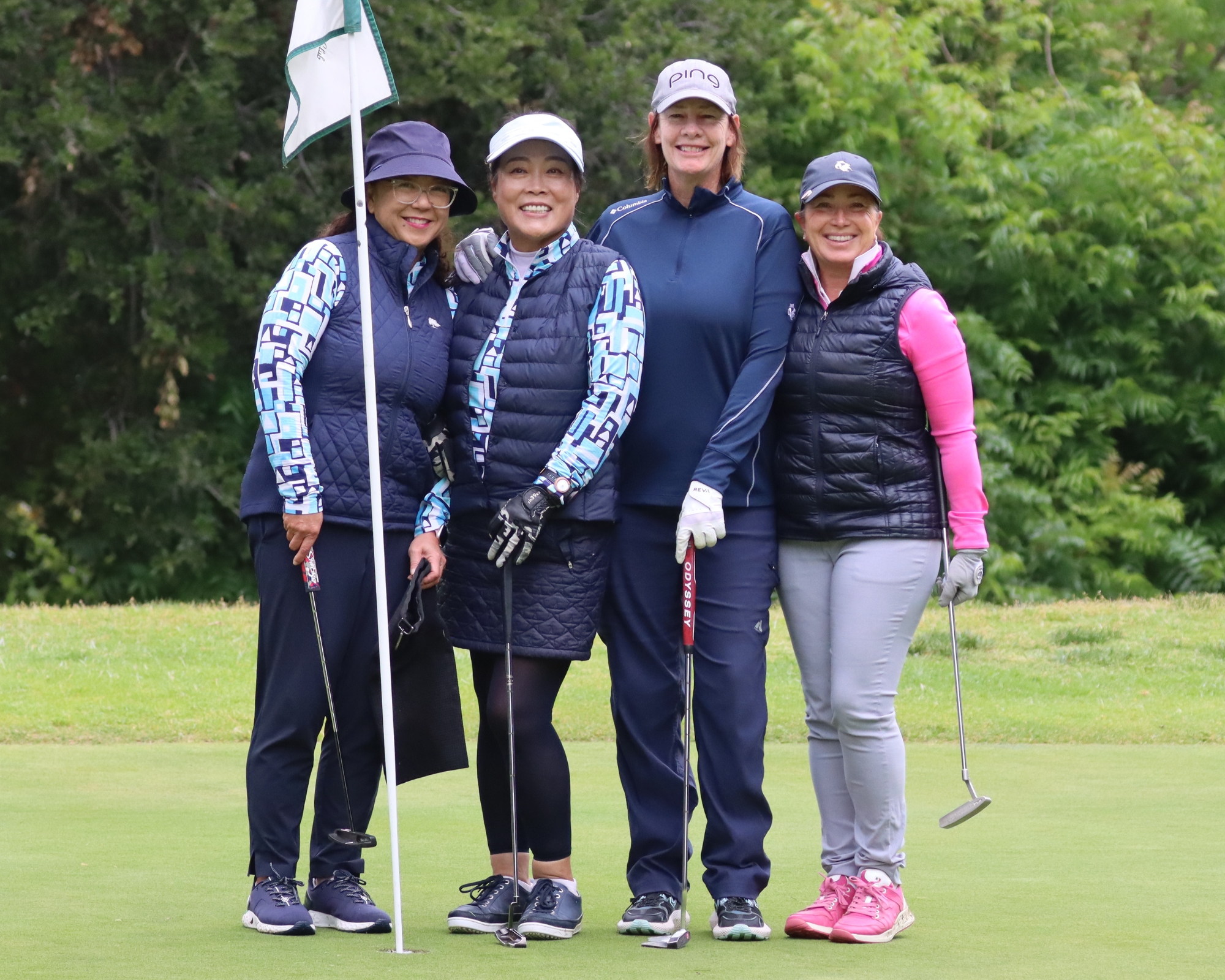 Women golfers celebrating